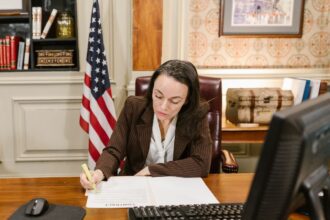 Lawyer reviewing legal documents illustrating a music royalty court dispute