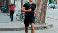 Runner using earphones during an urban workout
