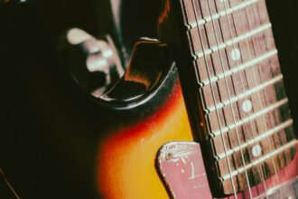 Close-up of electric guitar strings and hardware