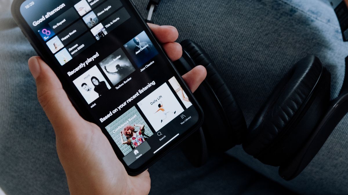 Spotify music streaming on a smartphone with headphones